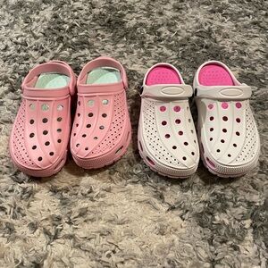 Slip on shoes both pairs size 9.5 pink and white